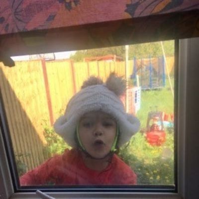 Legend spying on his mum through the window!